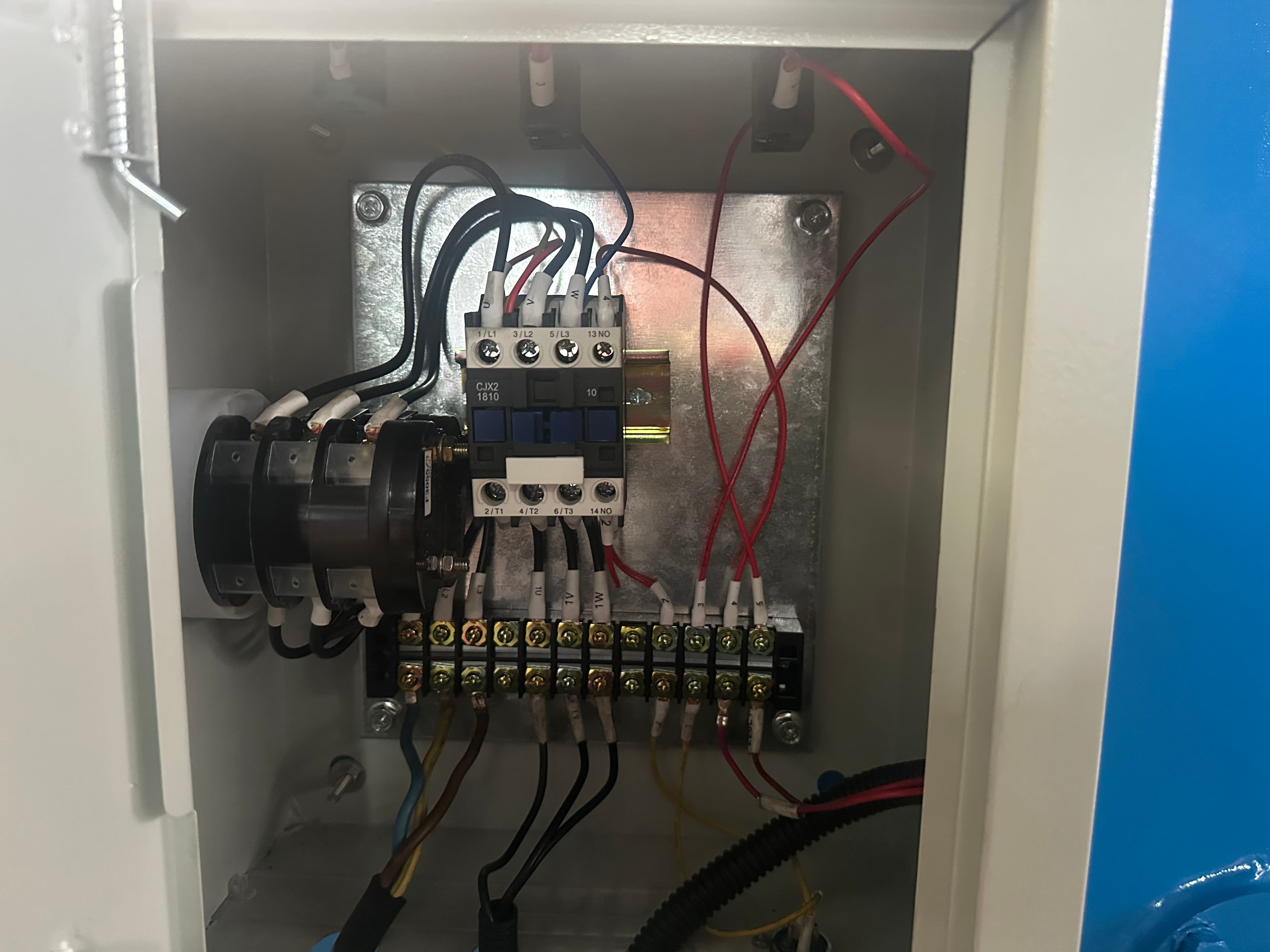 Electrical cabinet components installed inside a sheet metal machine