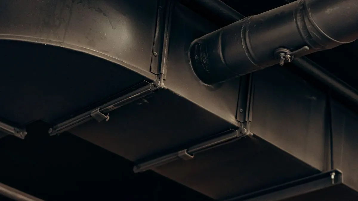 Installed rectangular HVAC ductwork made from folded sheet metal