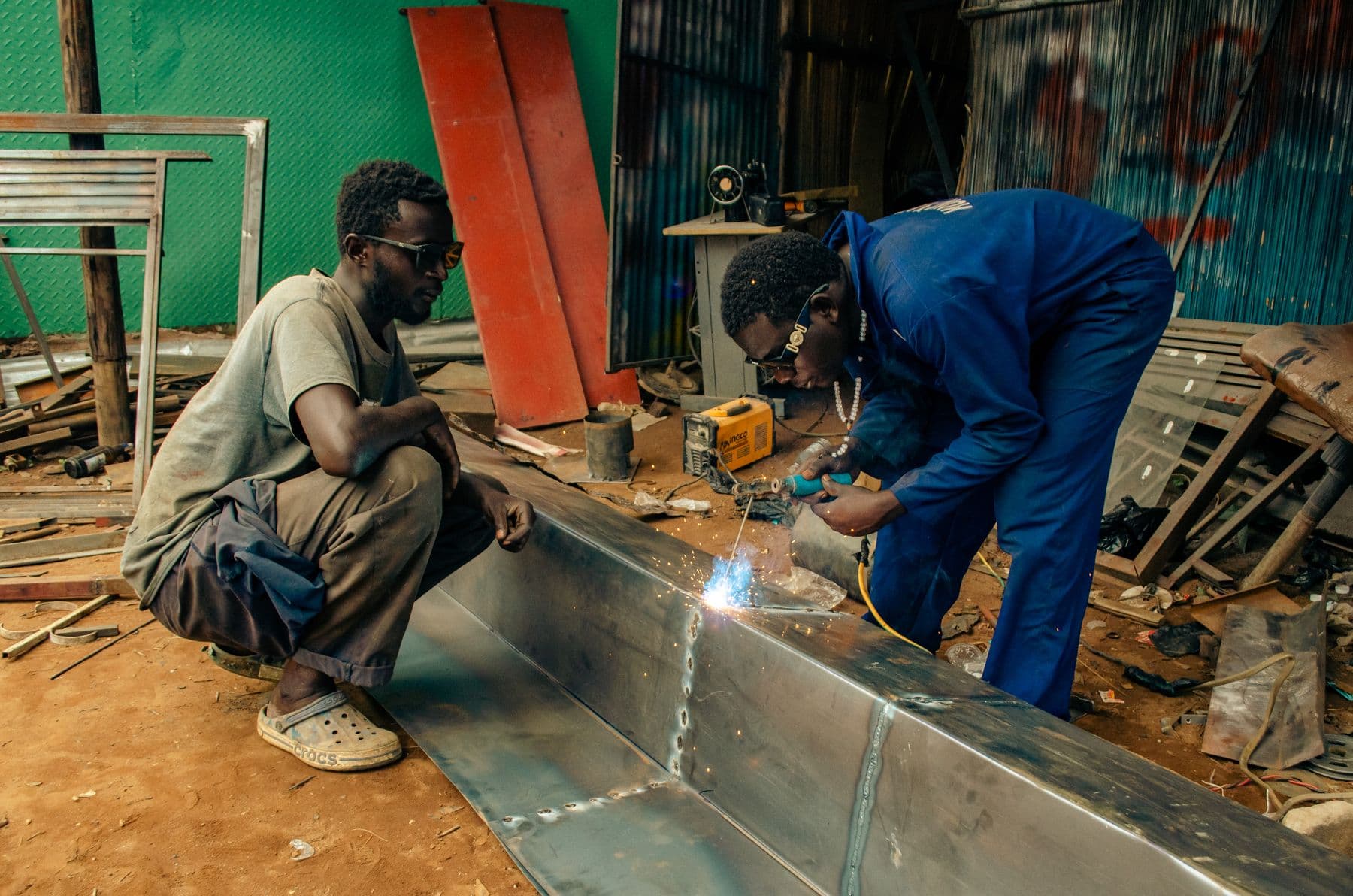 Sheet metal fabrication workshop preparing metal parts