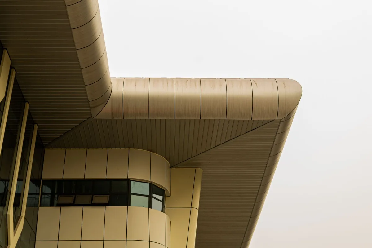 Real curved metal architectural panels and arc plates