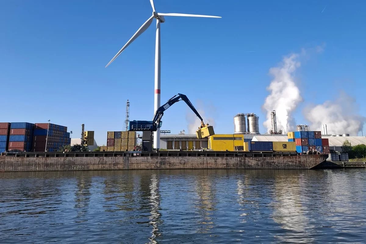 Real wind tower in an industrial harbor