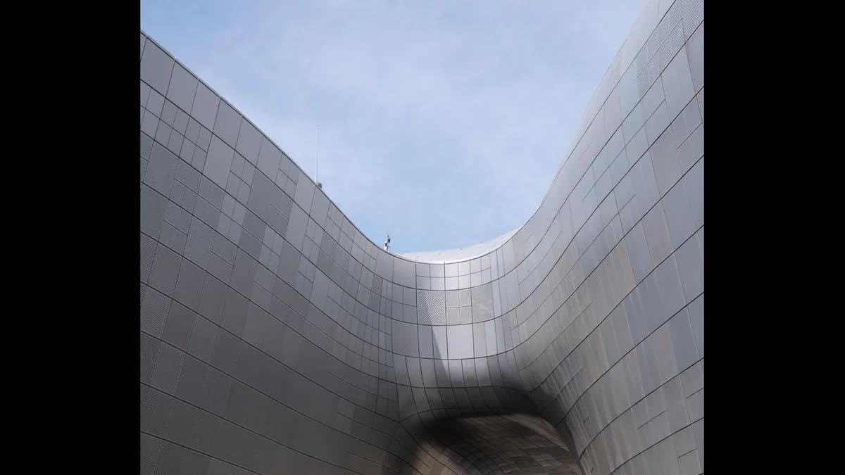 Real curved metal architectural facade panels